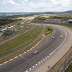 action-car-racing-track-view-from-a-drone