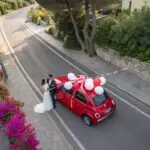personal-project-just-married-red-fiat-500-car-view-from-a-drone